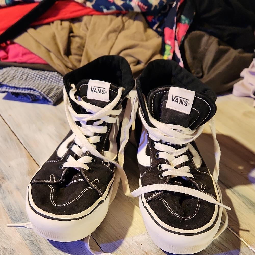 Vans Black and White Iconic Sneakers with Durable Construction